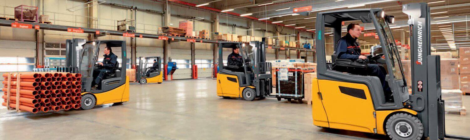 Jungheinrich forklifts working in warehouse