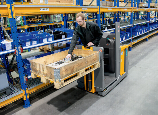 Jungheinrich EKS 110 in warehouse aisle