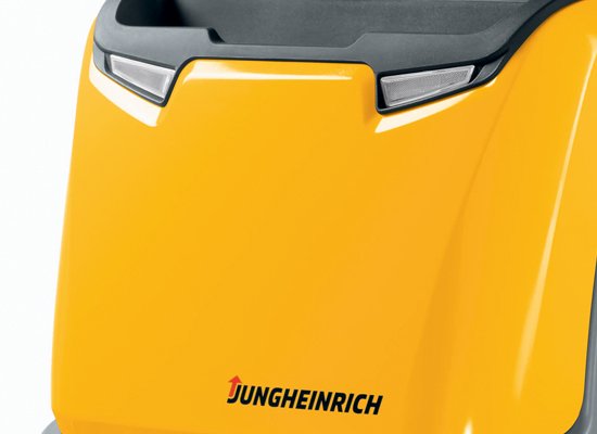 Jungheinrich EKS110 driving down aisle