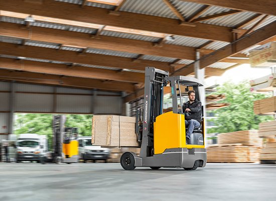 Operator Using a Jungheinrich Multi-Purpose Moving Mast Reach Truck to Move Material