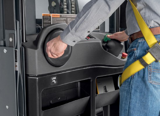 Close-up of an Operator Using the Jungheinrich High-Level Order Picker Controls