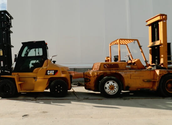 Two forklifts at Mystic Seaport