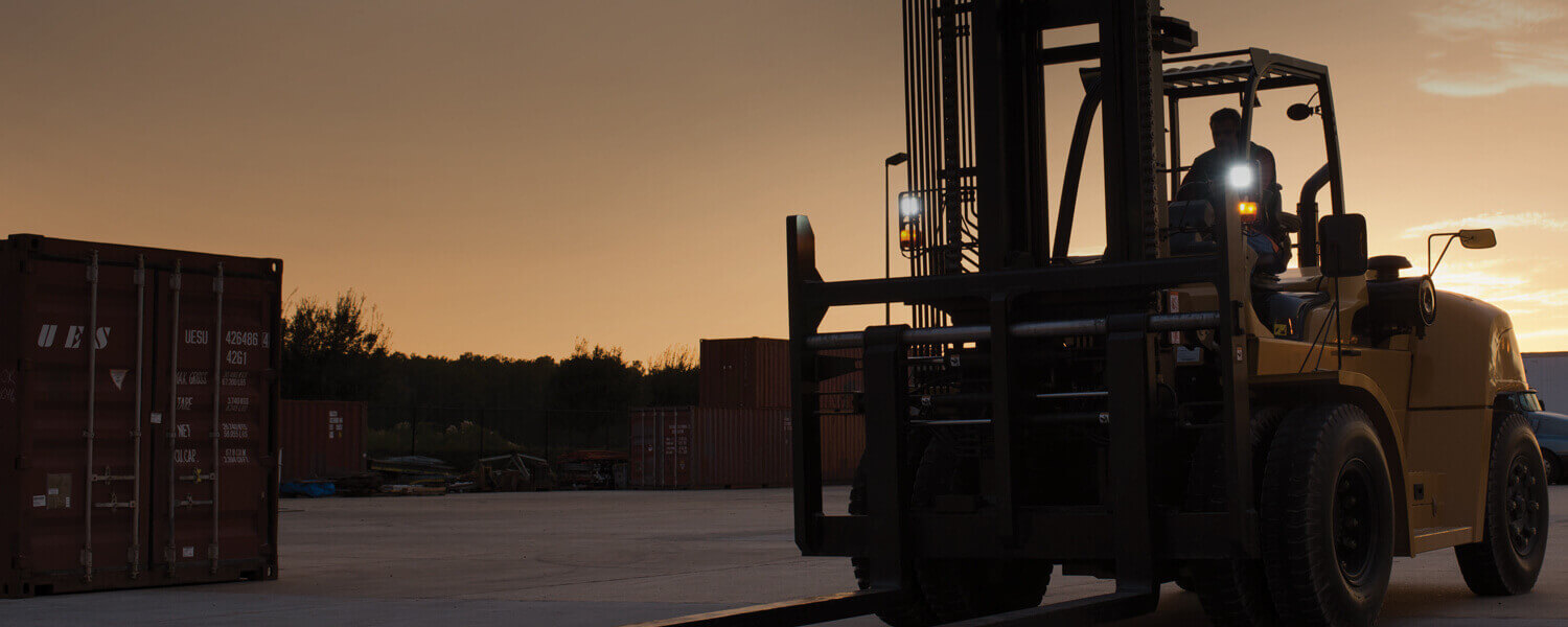 Cat Lift Truck working at dawn