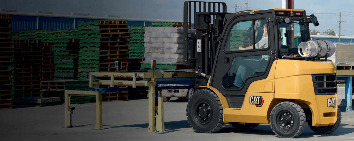 Cat Lift Truck working at dawn