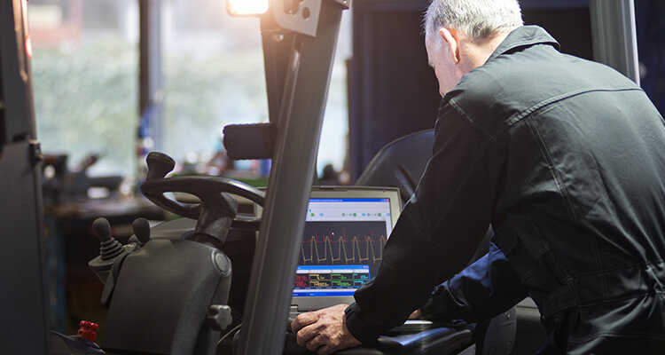 performing maintenance on a forklift