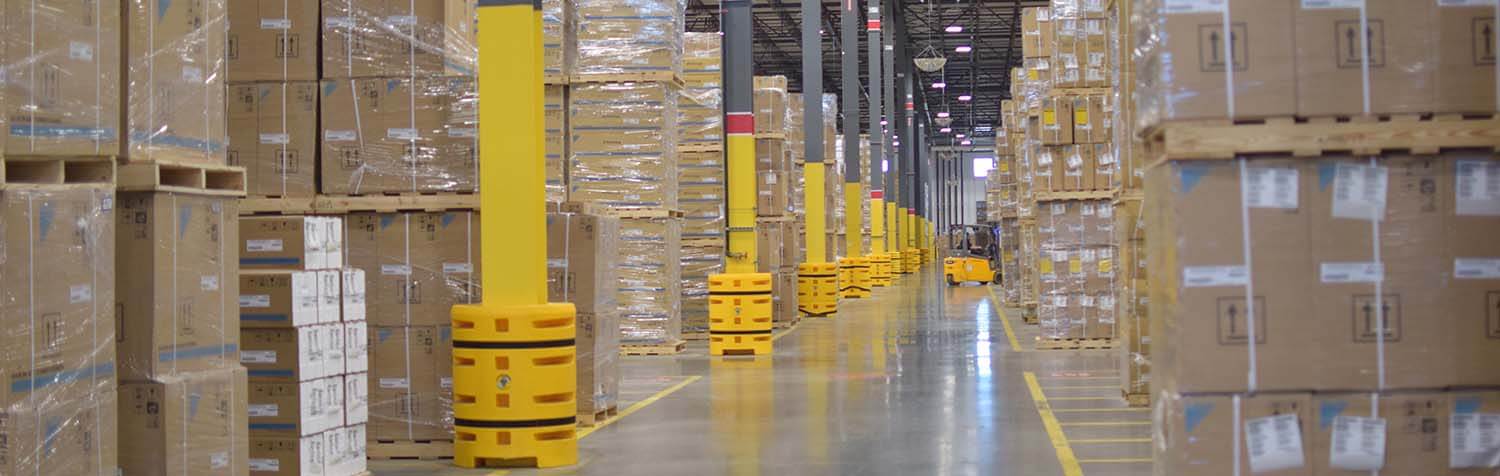 Wrapped Cardboard Boxes Stacked in a Warehouse