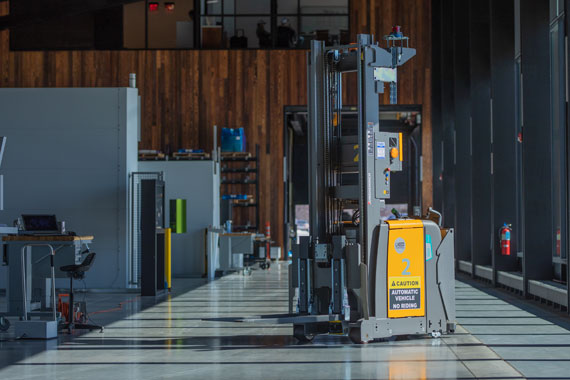 jungheinrich agv in sunlit hallway