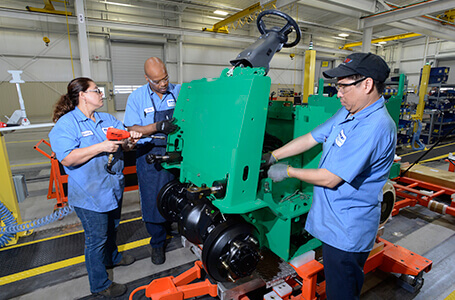 Employees Assembling a Mitsubishi Lift Truck