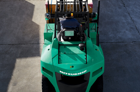 Overhead view of forklift operator in action