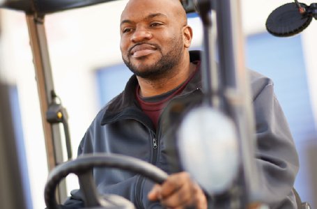 Operator driving a Mitsubishi forklift truck