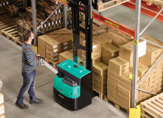Overhead View of a Man using a Mitsubishi Electric Pedestrian Stacker in a Warehouse