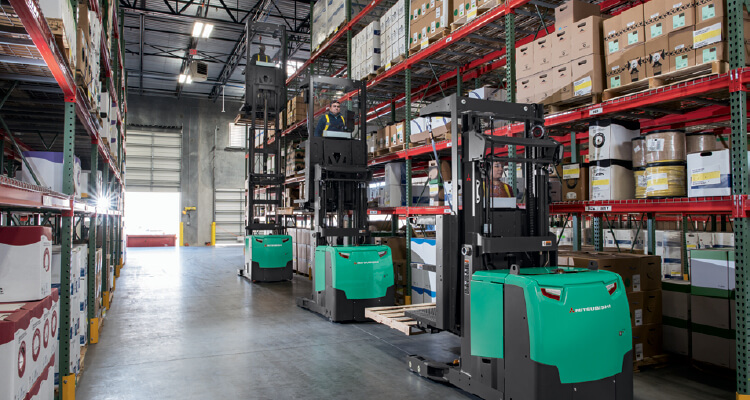 Mitsubishi forklifts lifting pallets